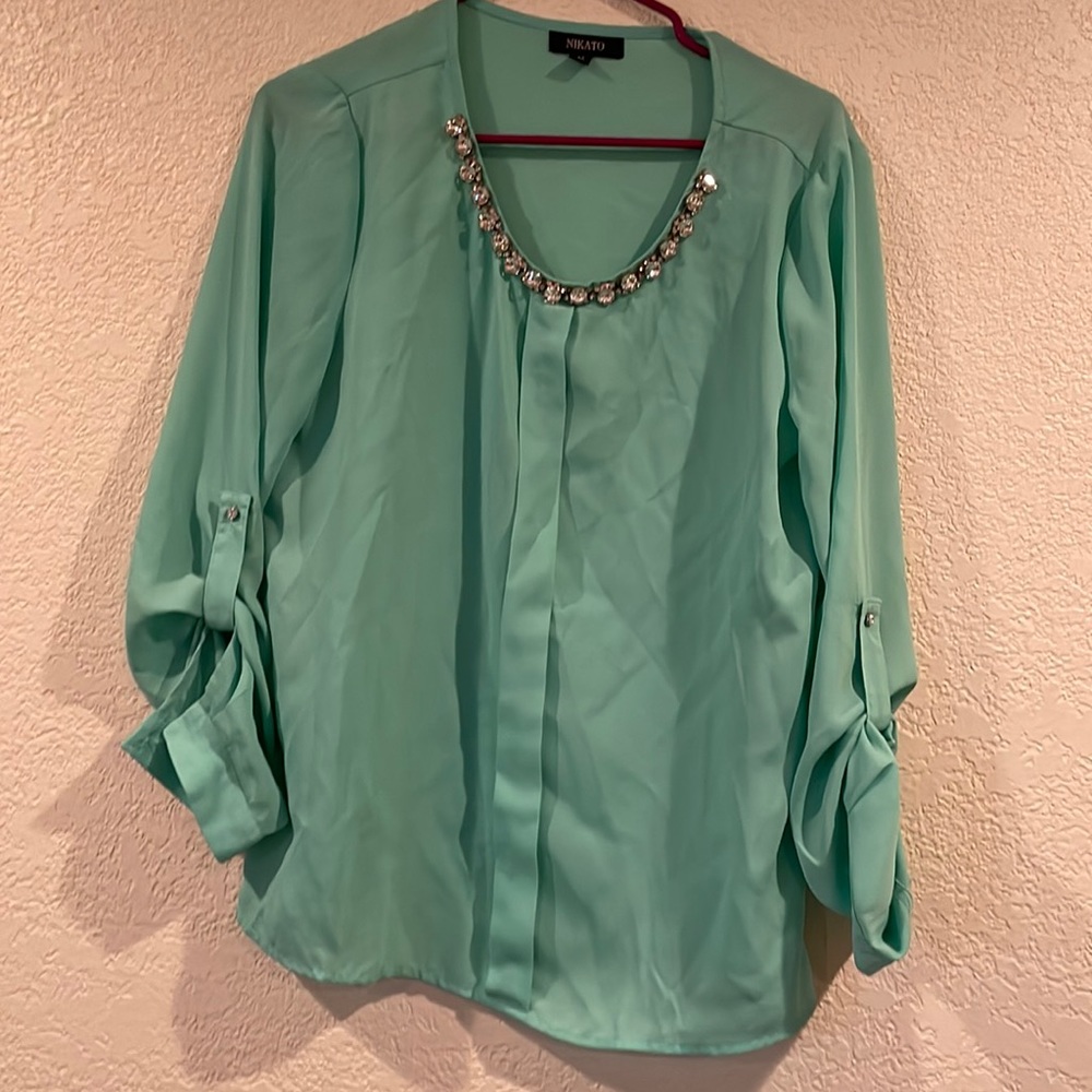 Mint colored blouse with gems on top